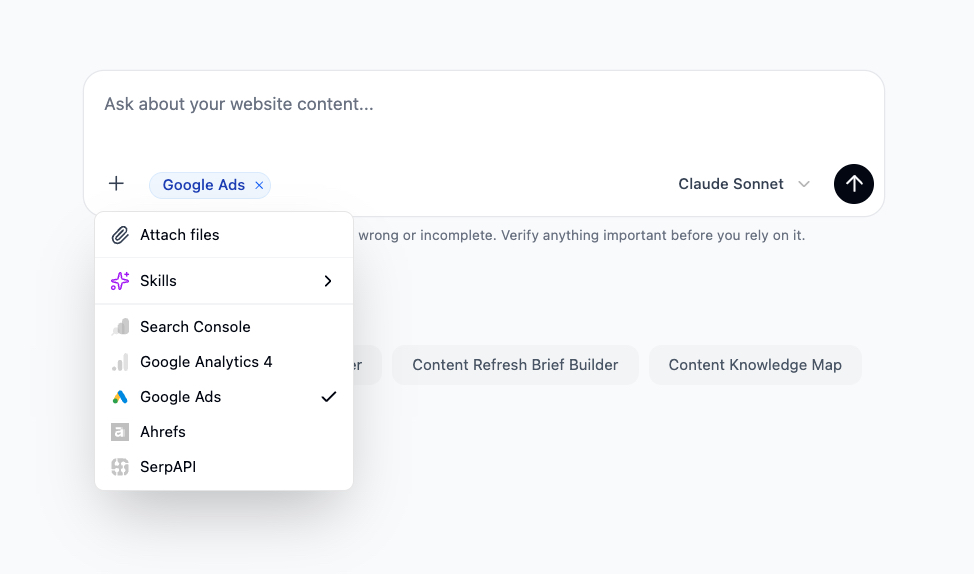 The Morrison Chat composer with the + menu open. Google Ads sits in the source list alongside Search Console, Google Analytics 4, Ahrefs and SerpAPI, with a Google Ads chip active on the composer.
